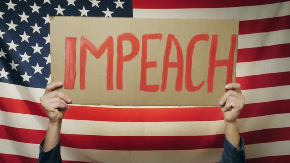 US President Impeachment Sign in Hands