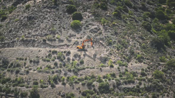 Digger Work Mine in Rocky Ground on Mountain Wilderness Area in Troodos Cyprus