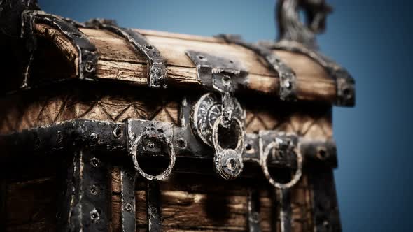 Closed Wooden Treasure Chest with Metal Clasp alt