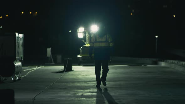 Anonymous Engineer Walking on Work Site