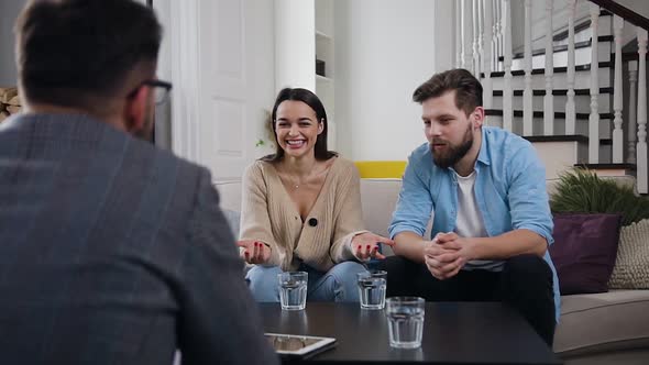Woman Telling to the Male Professional Therapist about the Problems in Relationships
