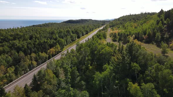 aerial view of highway 1 in north shore minnesota during a summer afternoon