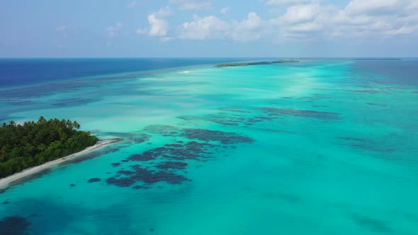 Aerial top view landscape of tranquil bay beach break by shallow ocean and white sand background of 