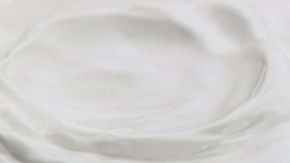 Super Slow Motion Shot of Waving Fresh Cream at 1000 Fps alt