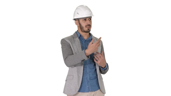 Architect talking to camera on white background