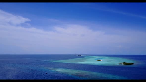 Aerial landscape of tranquil bay beach break by turquoise sea and white sandy background of a dayout