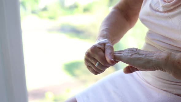 Elderly Senior Woman Hands Applying Cream Lotion Moisturizer