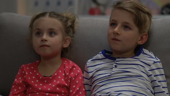 Boy and Girl Watching Tv at Night, Scared When Parents Suddenly Return Home