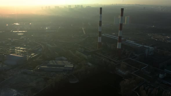 Factory in the City Top View Two Pipes From Which Smoke Comes