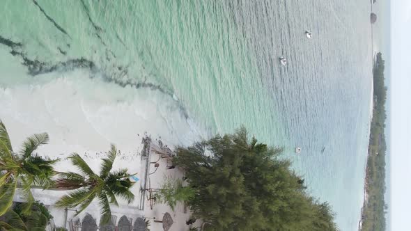 Vertical Video of the Ocean Near the Coast of Zanzibar Tanzania Aerial View