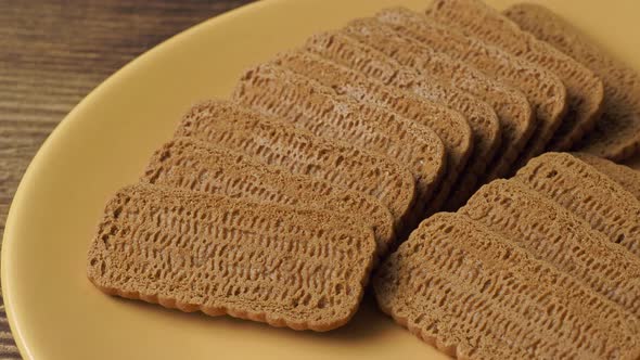 Cookies on a yellow plate