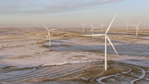 Aerial shots of wind turbines on a cold winter afternoon in Calhan, Colorado