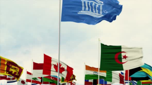 UNESCO Flag With World Globe Flags Morning Shot alt