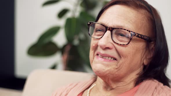 Smiling Senior Elderly Woman Portrait Close-up. Mature Woman In Glasses Portrait Close Up.