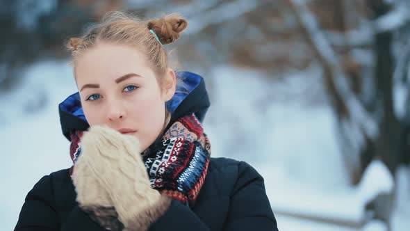 Young Woman With Blue Eyes in Winter
