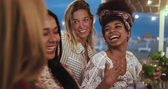 Happy multiracial girls having fun at beach party outdoor