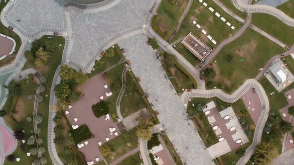 Aerial Drone Zoom in Fly Over Tbilisi Rike Park in Summer