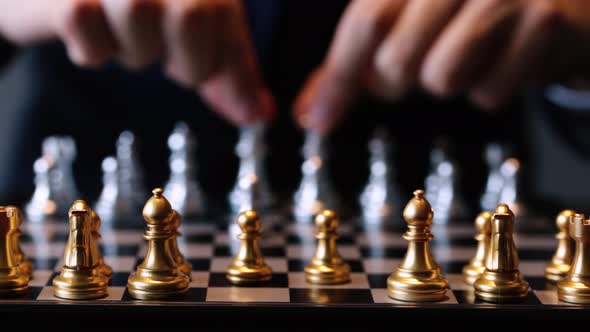 Cropped Shot of Businessman Playing Chess