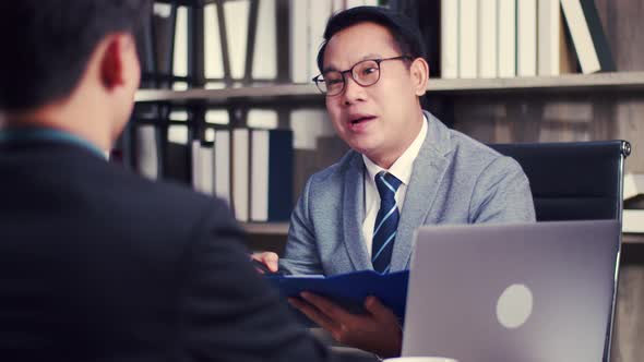 Job interview, Confident executive asking candidate question new employee at the office.