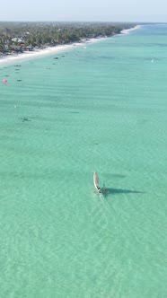 Vertical Video Boats in the Ocean Near the Coast of Zanzibar Tanzania