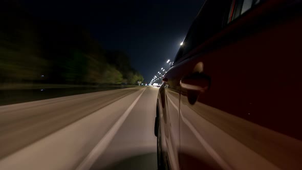 Drivelapse From Side of Car Moving on a Night Highway Timelapse Hyperlapse