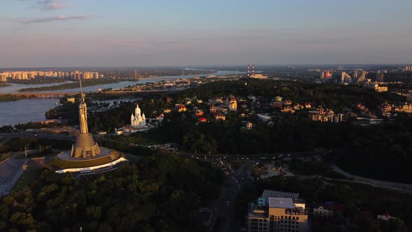 Aerial View of glorious The Motherland Monument located on the banks of Dnieper River