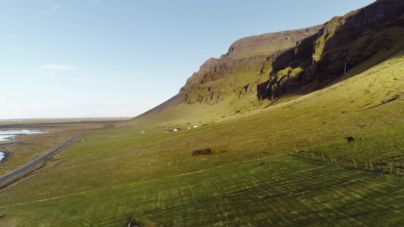 Farmland and Volcanic Mountains in East Iceland