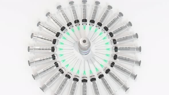 Vial with Cancer Vaccine and Syringes