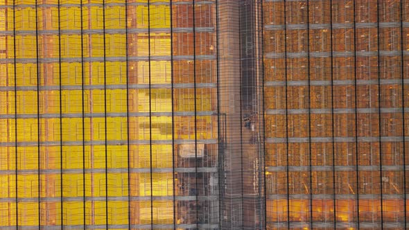 Industrial Greenhouses with Yellow Light in Winter Top View