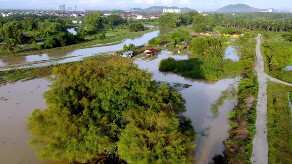 Kampung house flooded with rain water