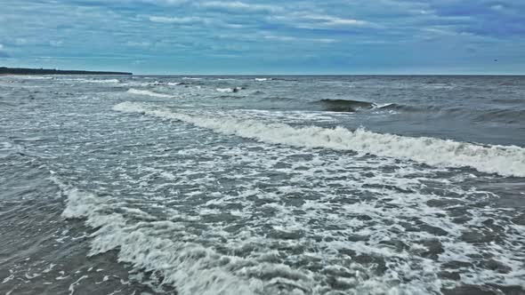 Aerial view of waves on Baltic Sea in summer