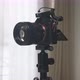 close up zoom in of camera installed on heavy tripod heads. - VideoHive Item for Sale