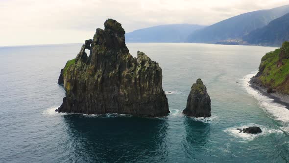 Flying Above Ribeira Da Janela Volcanic Sea Stacks in Madeira Island Portugal