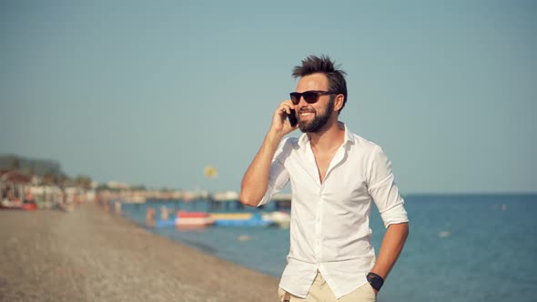 Mobile Worker Talking On Mobile Phone With Friend Office Outdoor. Man Talking Smartphone On Sea.