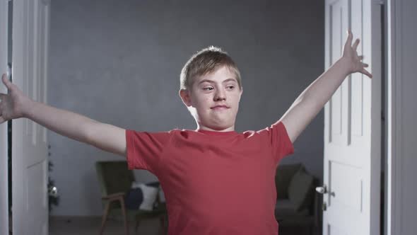 Portrait of a Happy Boy with Down Syndrome