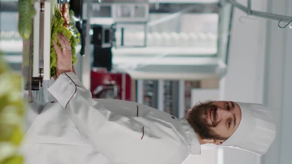 Vertical Video Portrait of Male Cook Preparing Gourmet Dish with Food Recipe