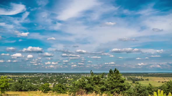 Landscape Fields and Moving Clouds in Blue Sky. Timelapse. Amazing Rural Valley. Ukraine