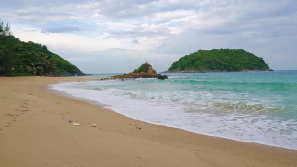 Tropical Beach with Beautiful Views of The Mountains and Islands