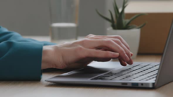 Female Hands of Caucasian Busy Business Woman Secretary Manager User Wear Green Jacket Sleeve