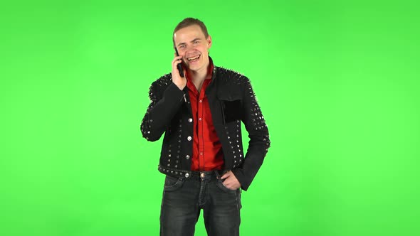 Guy Talking for Mobile Phone and Rejoice. Green Screen