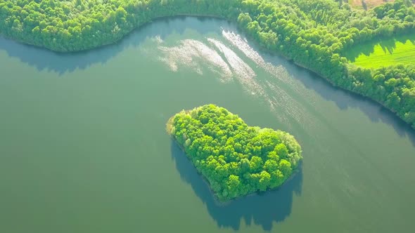 Aerial Photography From Drone of Lake and Small Island in Shape of Heart