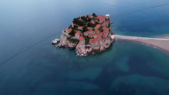 The famous island of Sveti Stefan located near Budva on the coast of Montenegro in the Balkans. A he