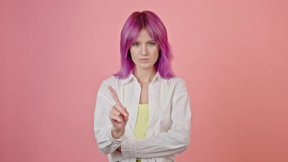 Young Woman Disagrees with Mocking Expression Closeup