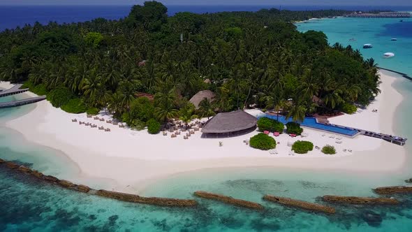 Drone aerial panorama of coast beach trip by blue ocean and sand background