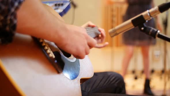 Music band performing in a studio