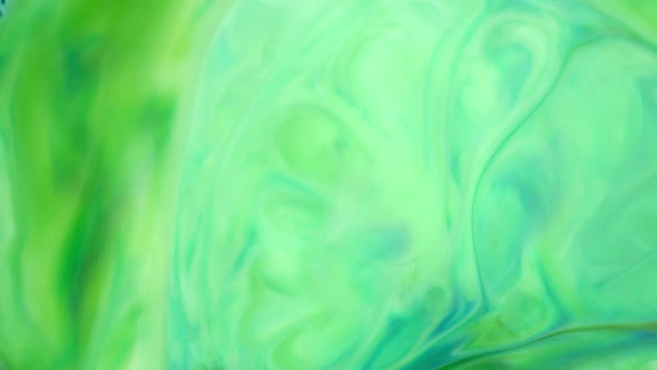  Footage. Ink in Water. Green Ink Reacting in Water Creating Abstract Background