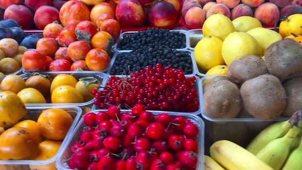Fruits and Berries on the Counter of the Farmer's Market