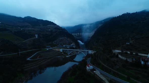 Fly Above Village, River and Dam of Tua, Portugal