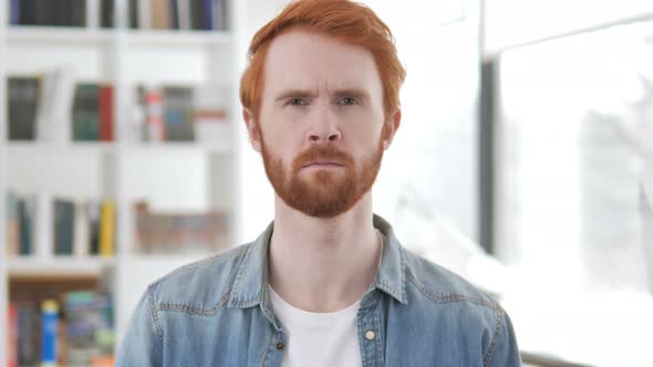 Casual Redhead Man Shaking Head To Reject