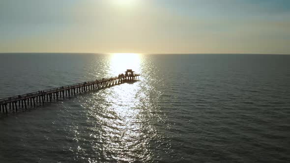 Sunset Over the Gulf of Mexico, Flying Above Pier.